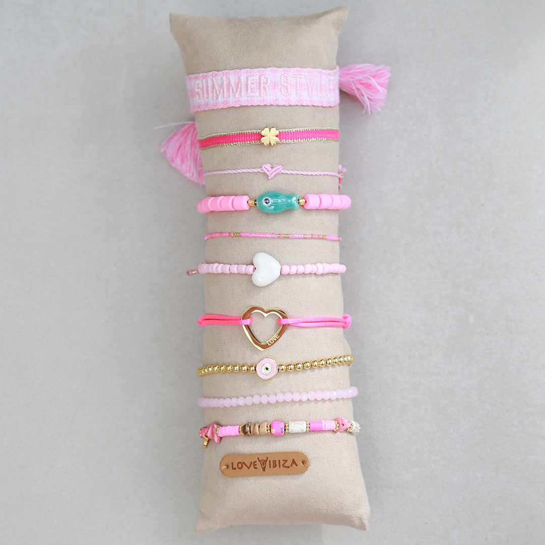 Display kussentje met 10 roze armbandjes