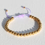 Armband gouden kraal geel