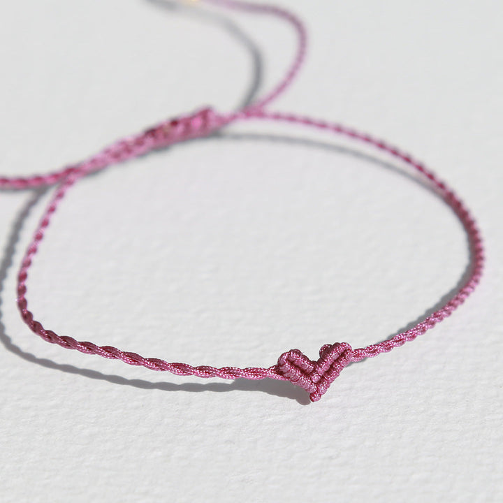 Armband klein hart magenta