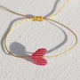 Armband neonoranges Herz