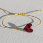 Armband neonoranges Herz