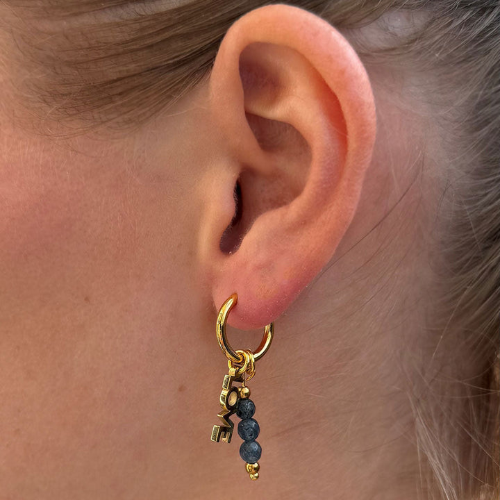 Boucles d'oreilles en or facettées amour bleu