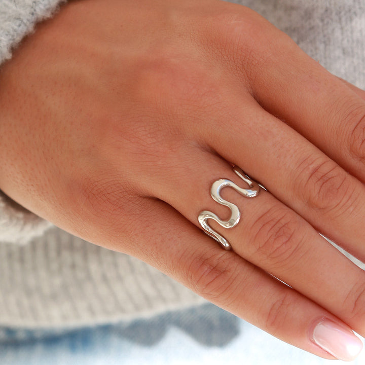 Zilveren ring swirl